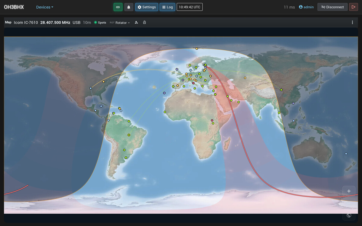 The map page: spots in band colors across the world, the spotters' lines, the beam and the gray line